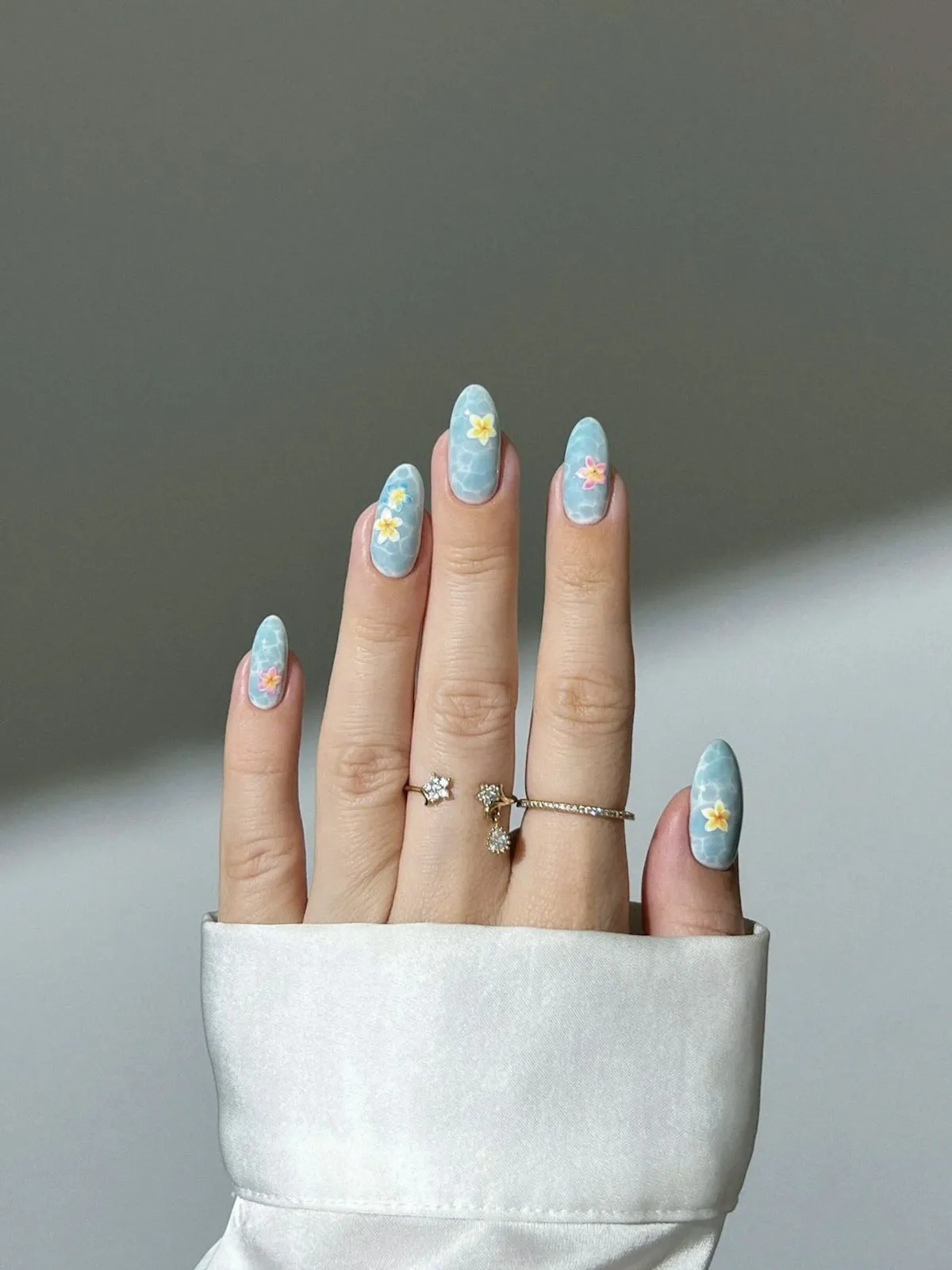 8 Beautiful Water-Inspired Nail Designs for Summer